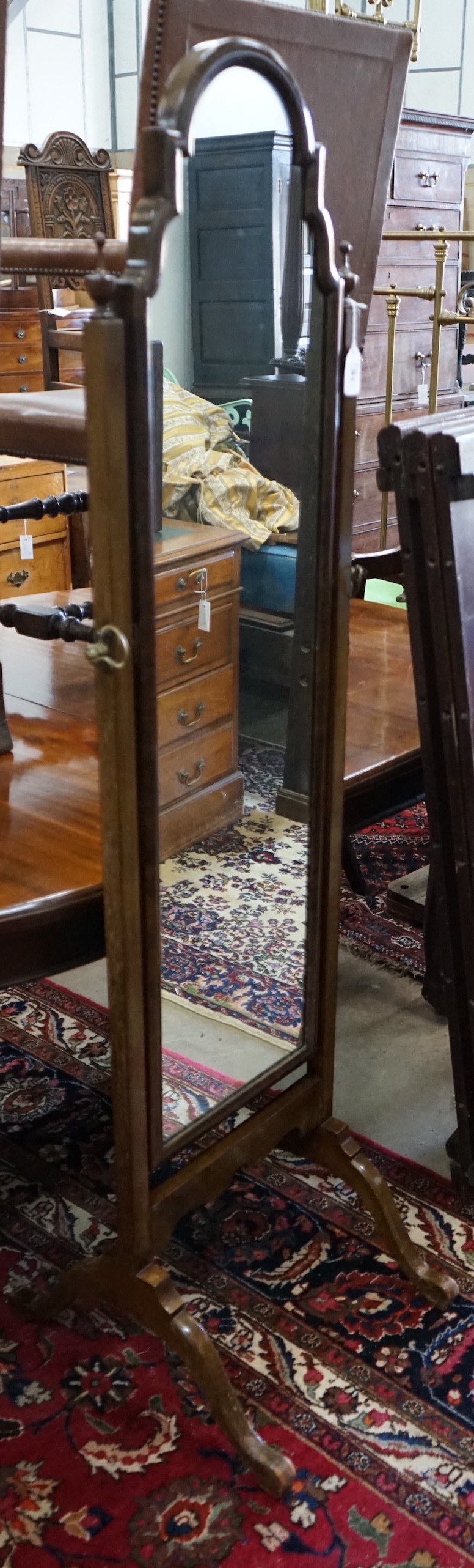 A Queen Anne revival walnut cheval mirror, width 46cm, height 159cm